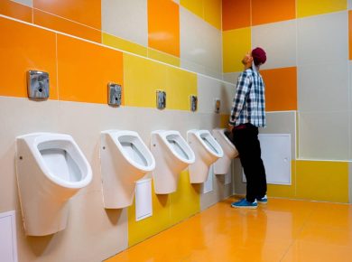 a-young-man-in-the-public-toilet-standing-next-to-2025-01-27-04-05-15-utc (1)