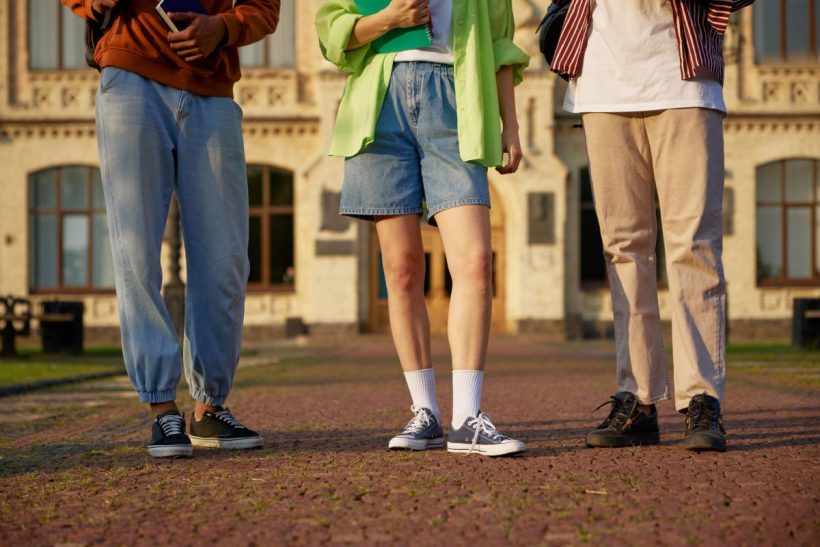 group-of-smart-students-standing-outdoors-at-campu-2024-11-26-05-39-23-utc