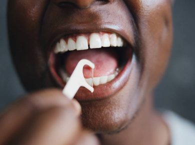 dental-floss-and-cleaning-with-teeth-of-black-man-2025-01-02-20-45-25-utc (1)