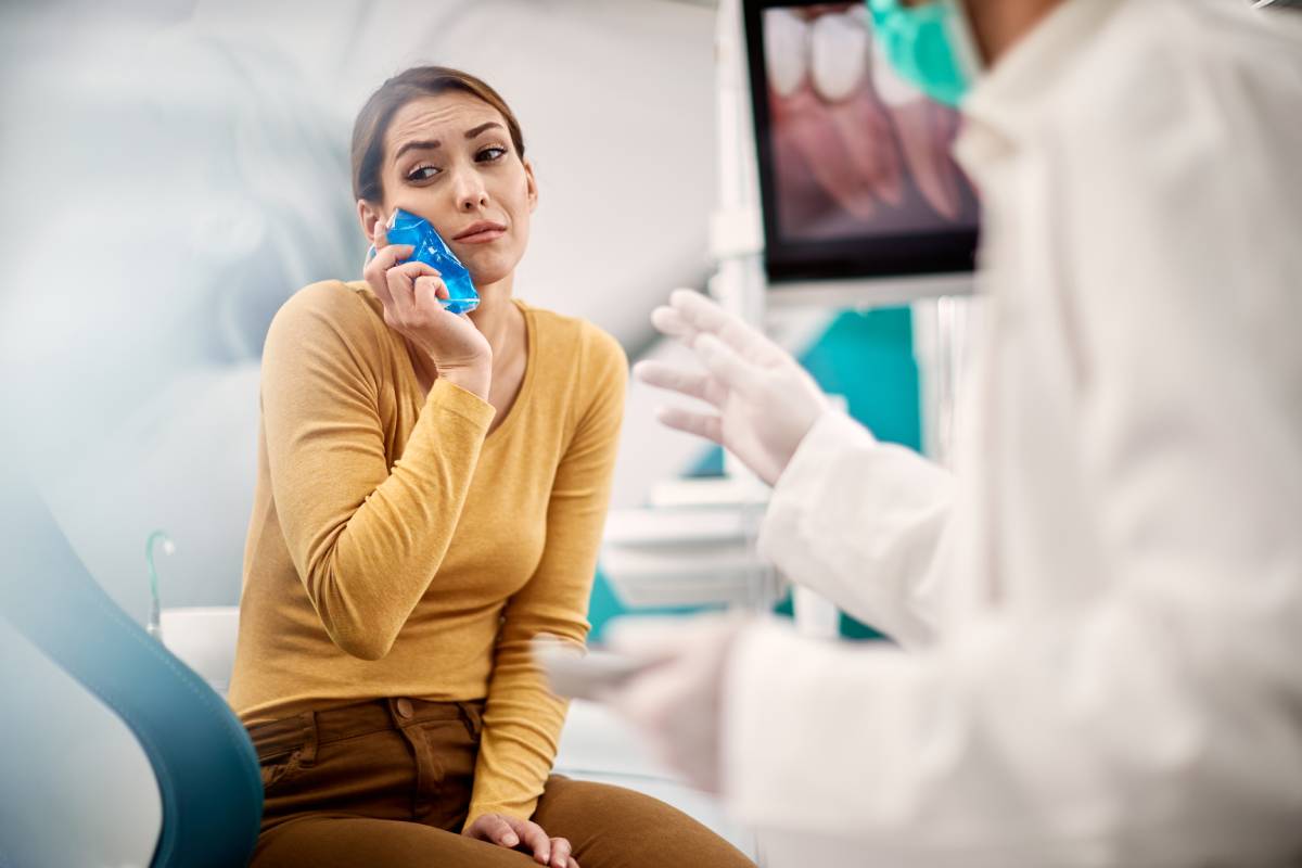 young-woman-with-toothache-having-appointment-at-d-2024-12-13-21-50-45-utc (1)